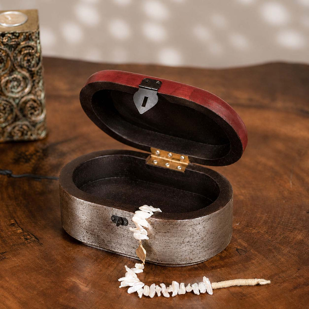Warm-silver and red oval wooden jewellery box 
