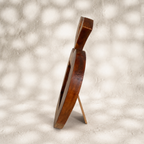 Side view of the Orchard apple-shaped wooden photo frame with easel stand