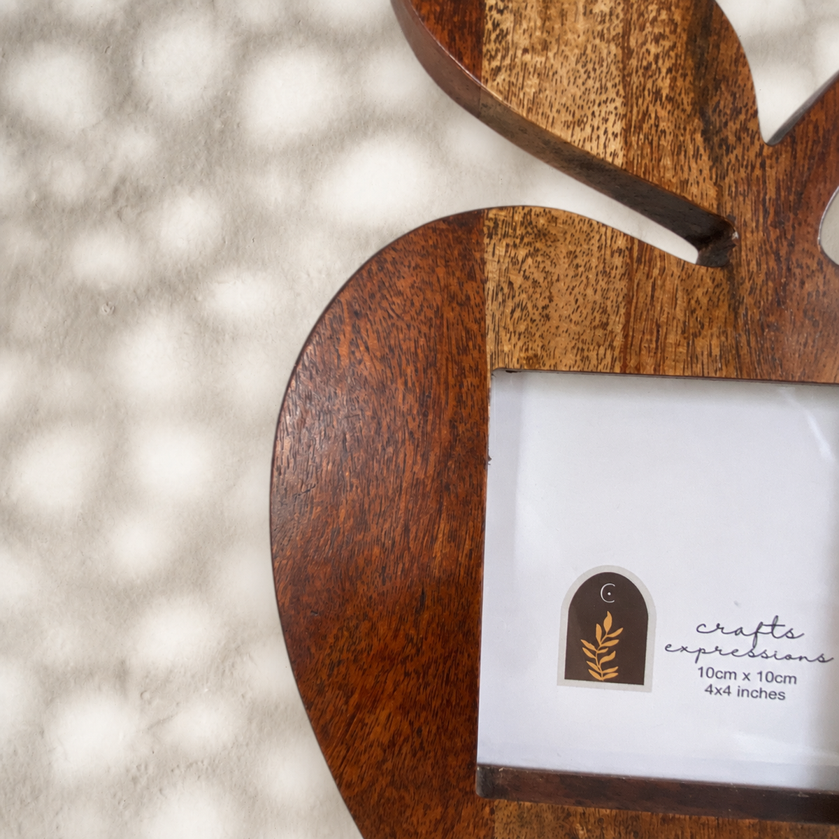 Close-up of the wood grain on the Orchard apple-shaped photo frame