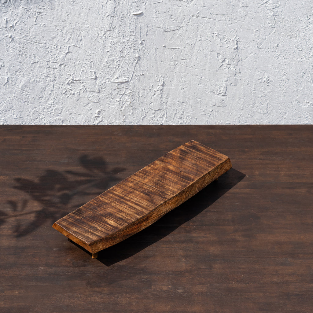 Side view of the empty Bark wooden riser