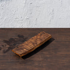 Side view of the empty Bark wooden riser