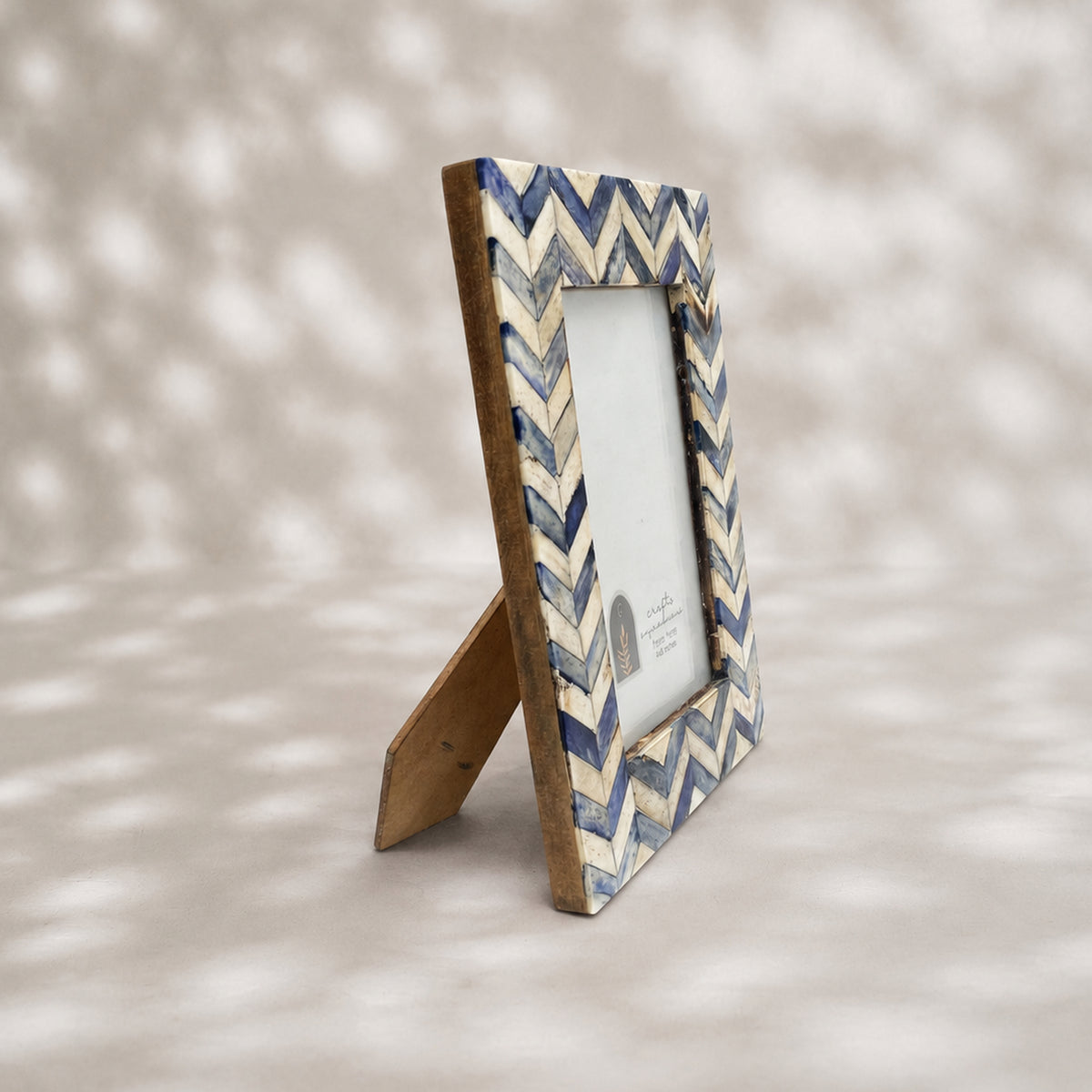 Blue and warm-white chevron wooden photo frame for a 4 by 6 inch photograph