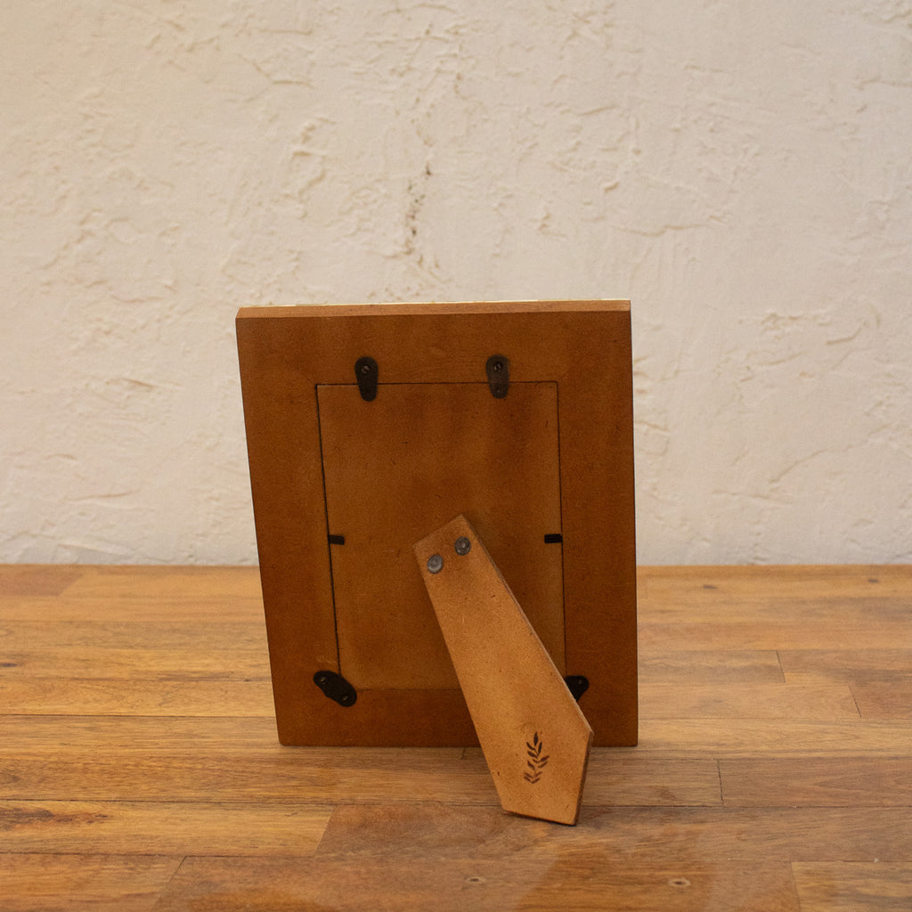 Back view of the Blue Carpet wooden photo frame with easel stand and wall fittings