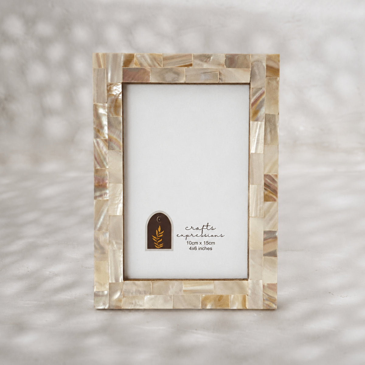 Champagne mother of pearl photo frame for a 4 by 6 inch photograph