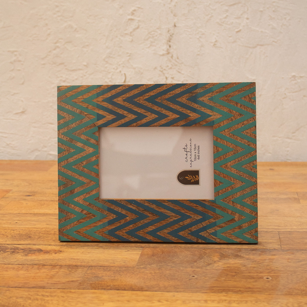 Front view of the Chevron wooden photo frame displayed horizontally