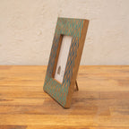 Angled view of the Chevron wooden photo frame displayed vertically