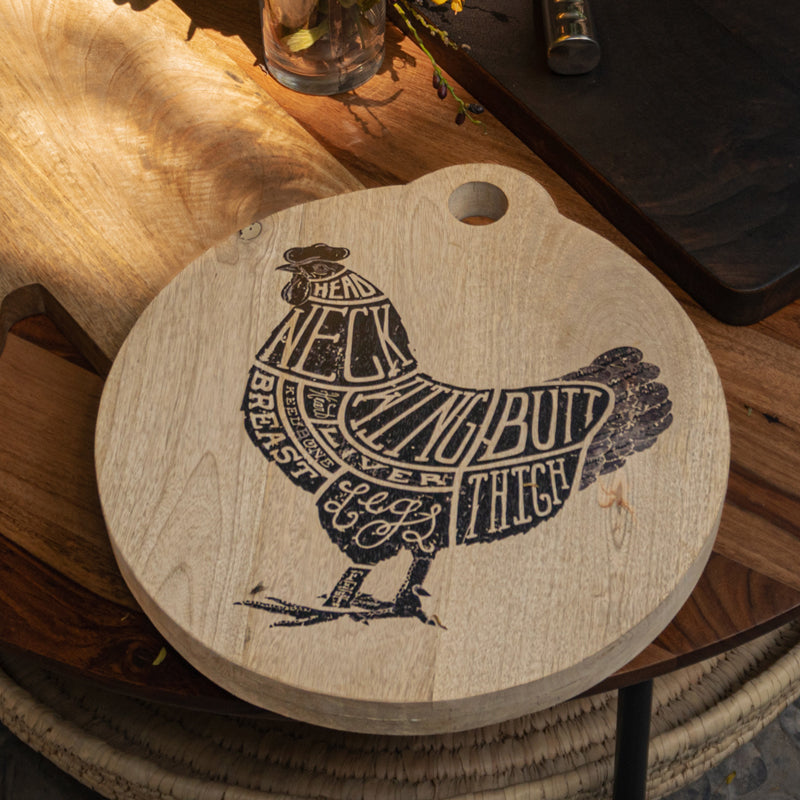 Cluck wooden butcher board with chicken illustration