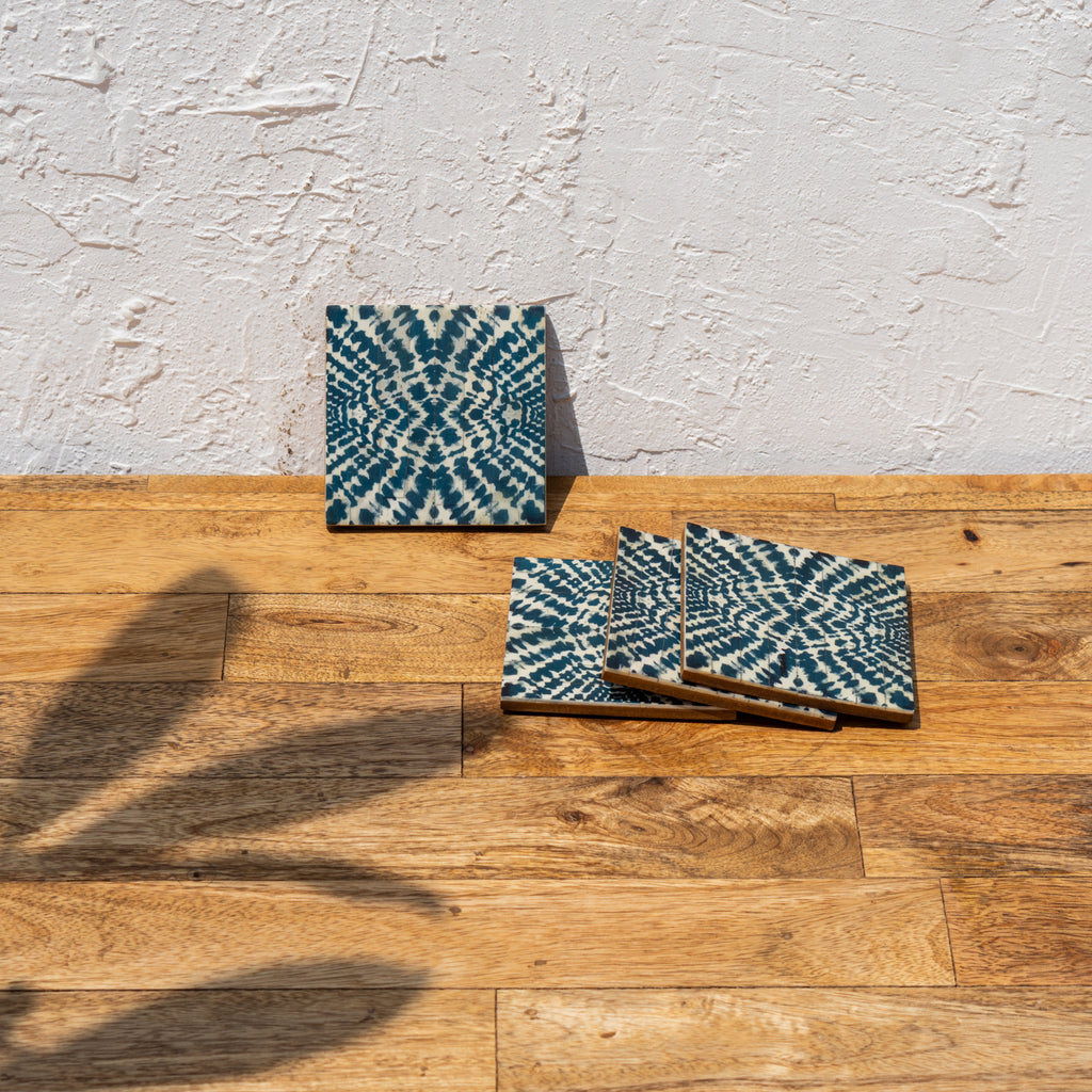 Coastal patterned coasters displayed upright and flat