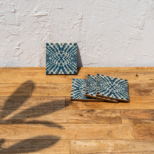 Coastal patterned coasters displayed upright and flat