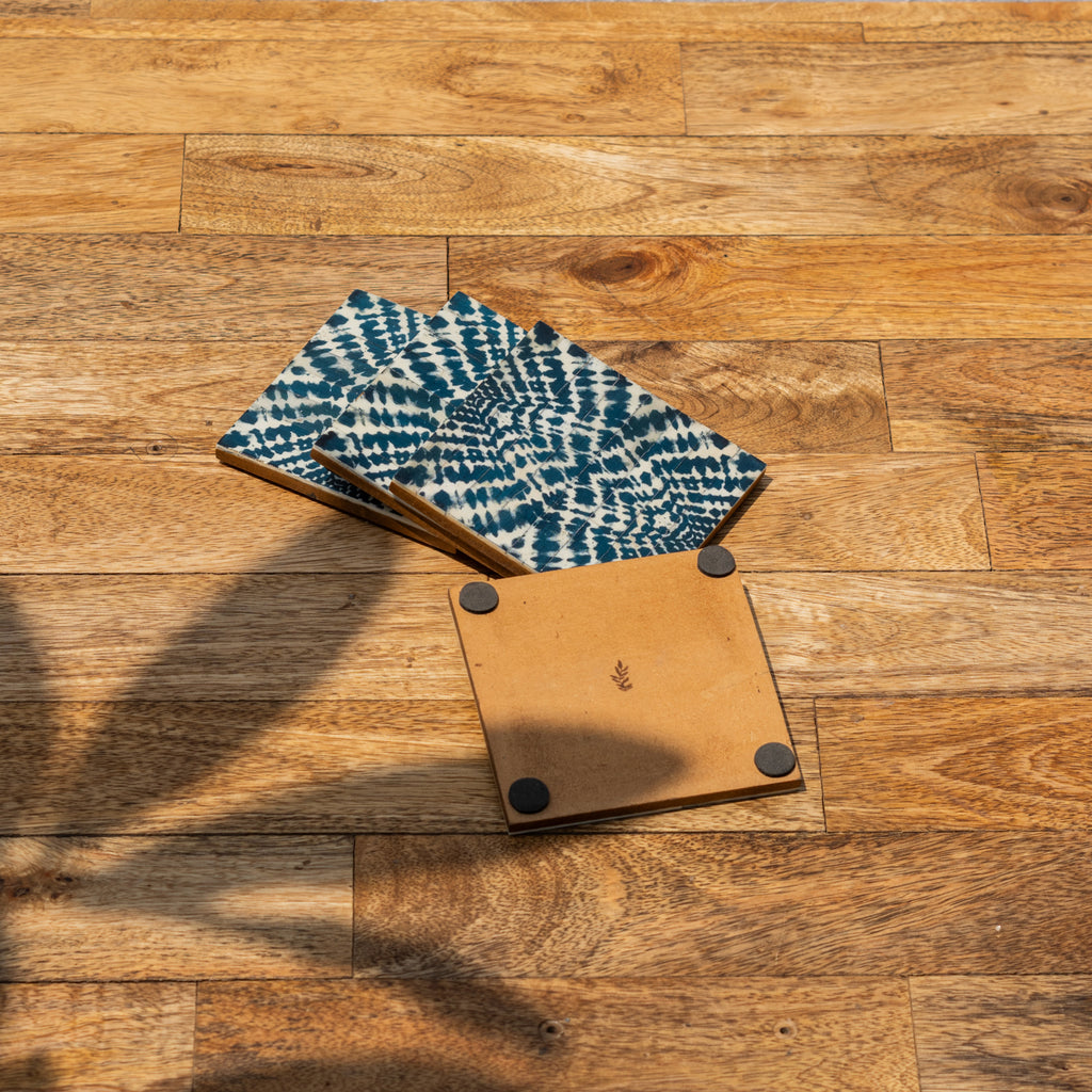 Coastal patterned coasters showing the printed fronts and plain backs