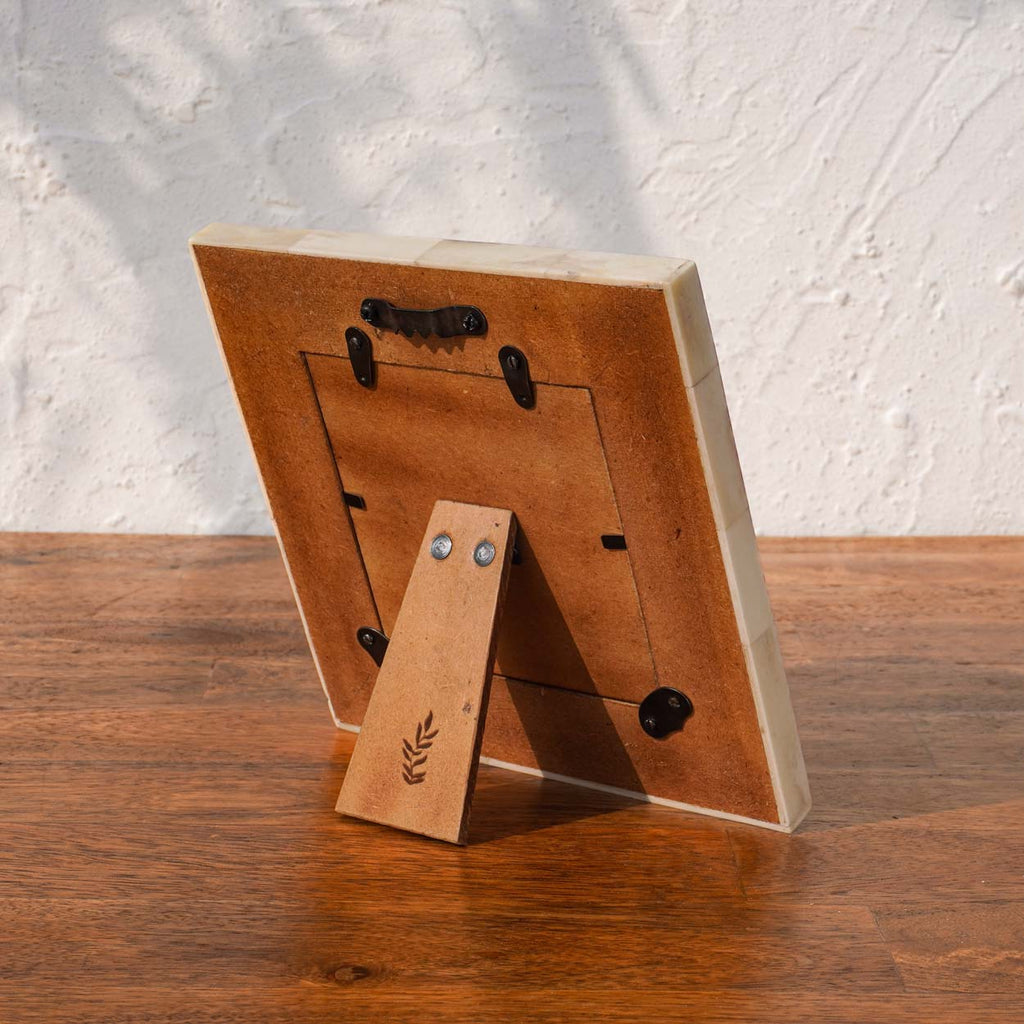Back view of the Dottie square photo frame with easel stand and wall hook