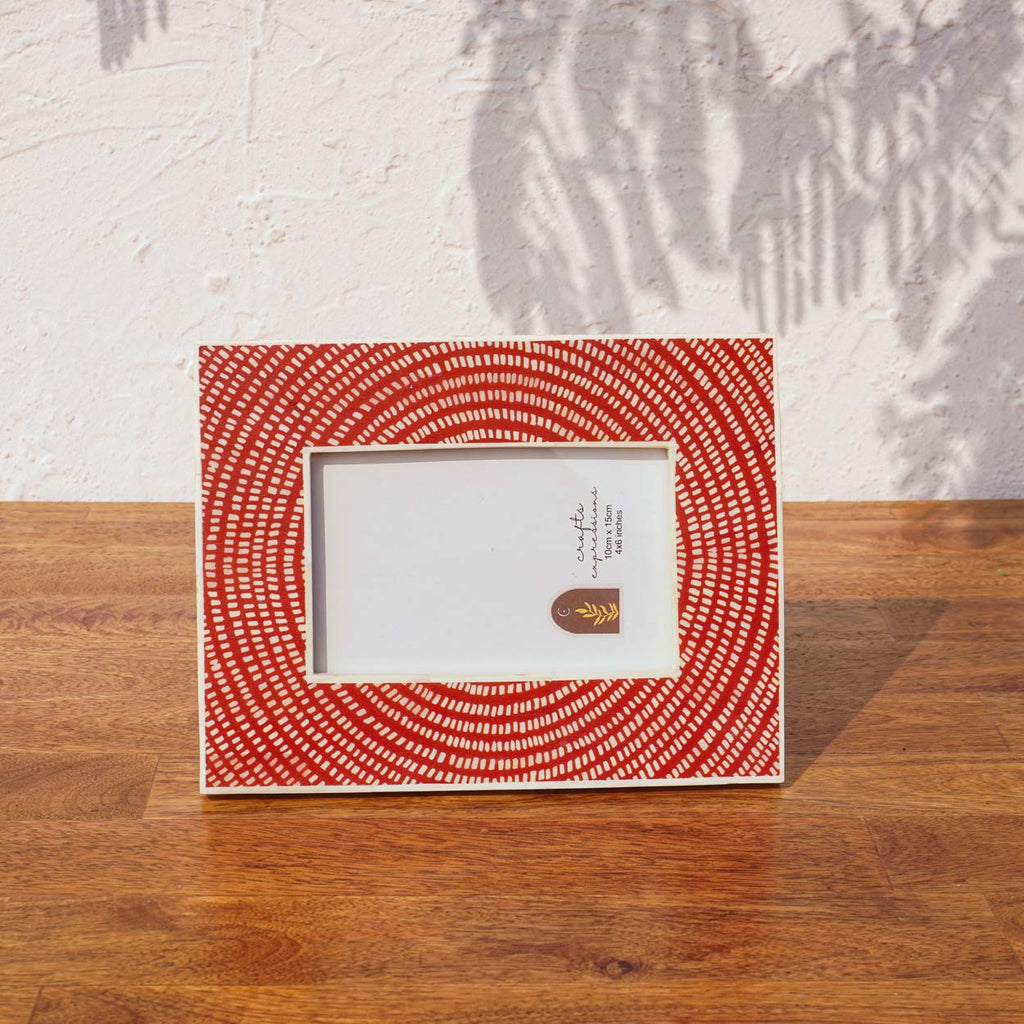 Echo red and off-white wooden photo frame displayed horizontally