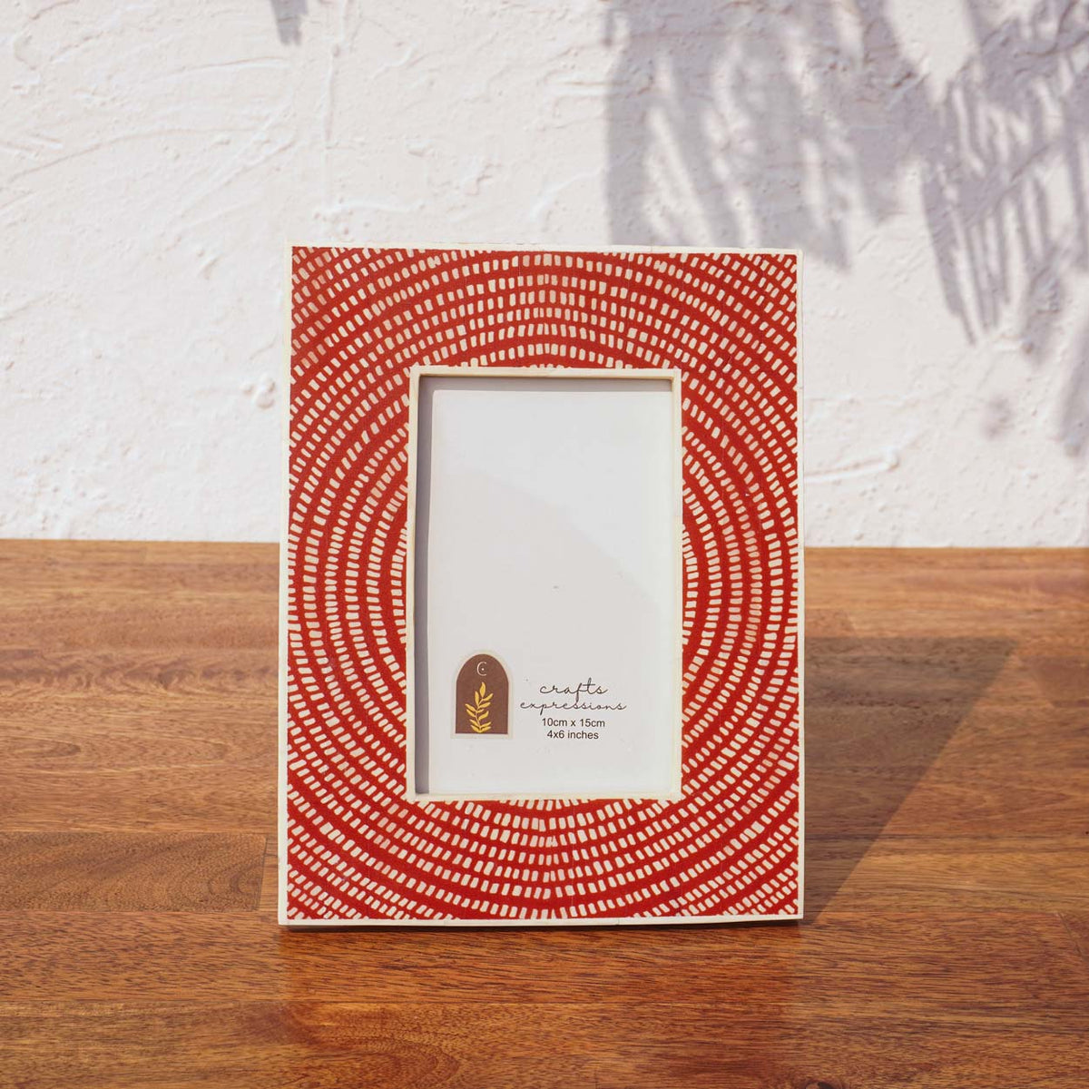 Front view of the Echo wooden photo frame in red and off-white