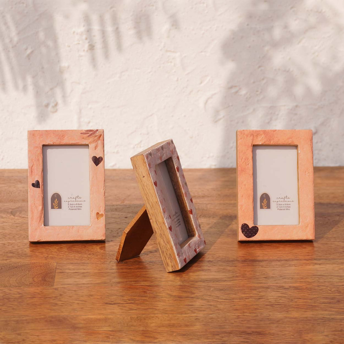 Front and side views of Beloved wooden Instax Mini frames with easel stands