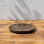 Side view of the Terrain wooden platter set