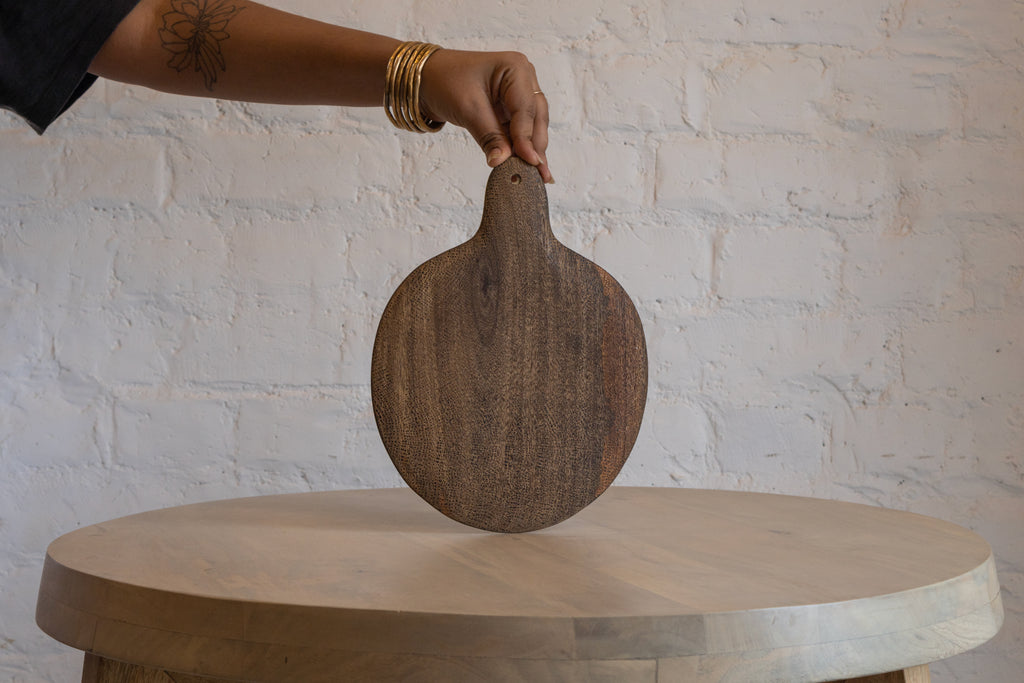 Large Plateau wooden board held upright in one hand