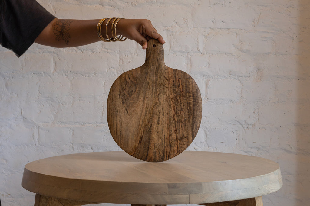 Large Plateau wooden board held upright in one hand