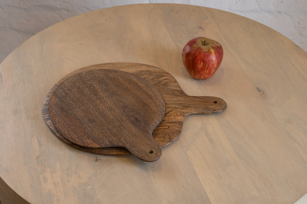 Plateau wooden board set displayed with a red apple