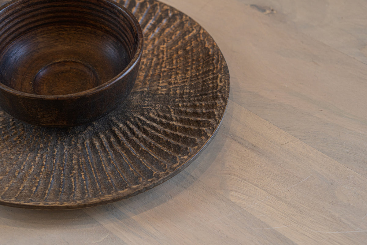 Close-up of a cup on the Siesta hamper wooden platter