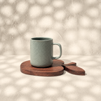 Orchard apple-shaped wooden trivet styled beneath a mug