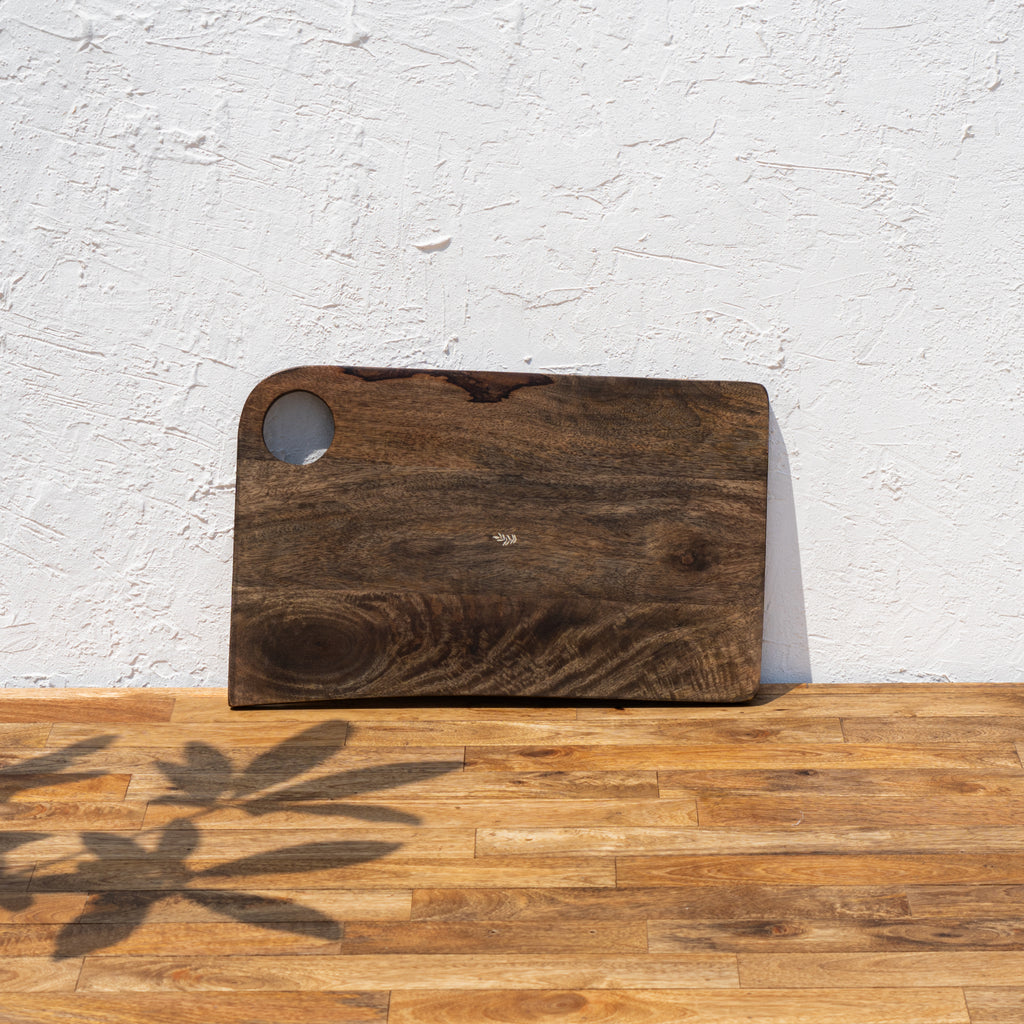 Front view of the Drift charcuterie board standing upright