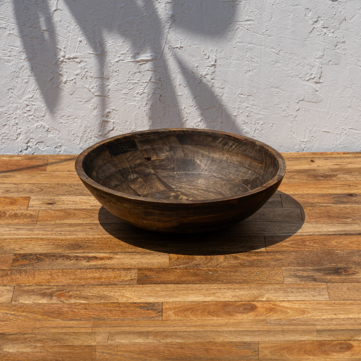 Empty Ellipse large wooden serving bowl viewed from the front