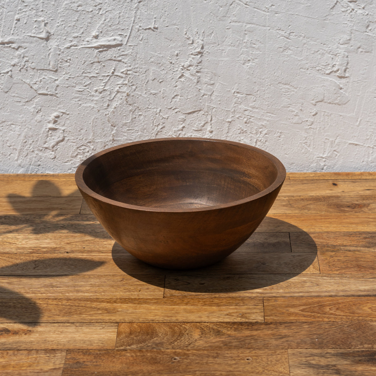 Side view of the small Ellipse wooden serving bowl