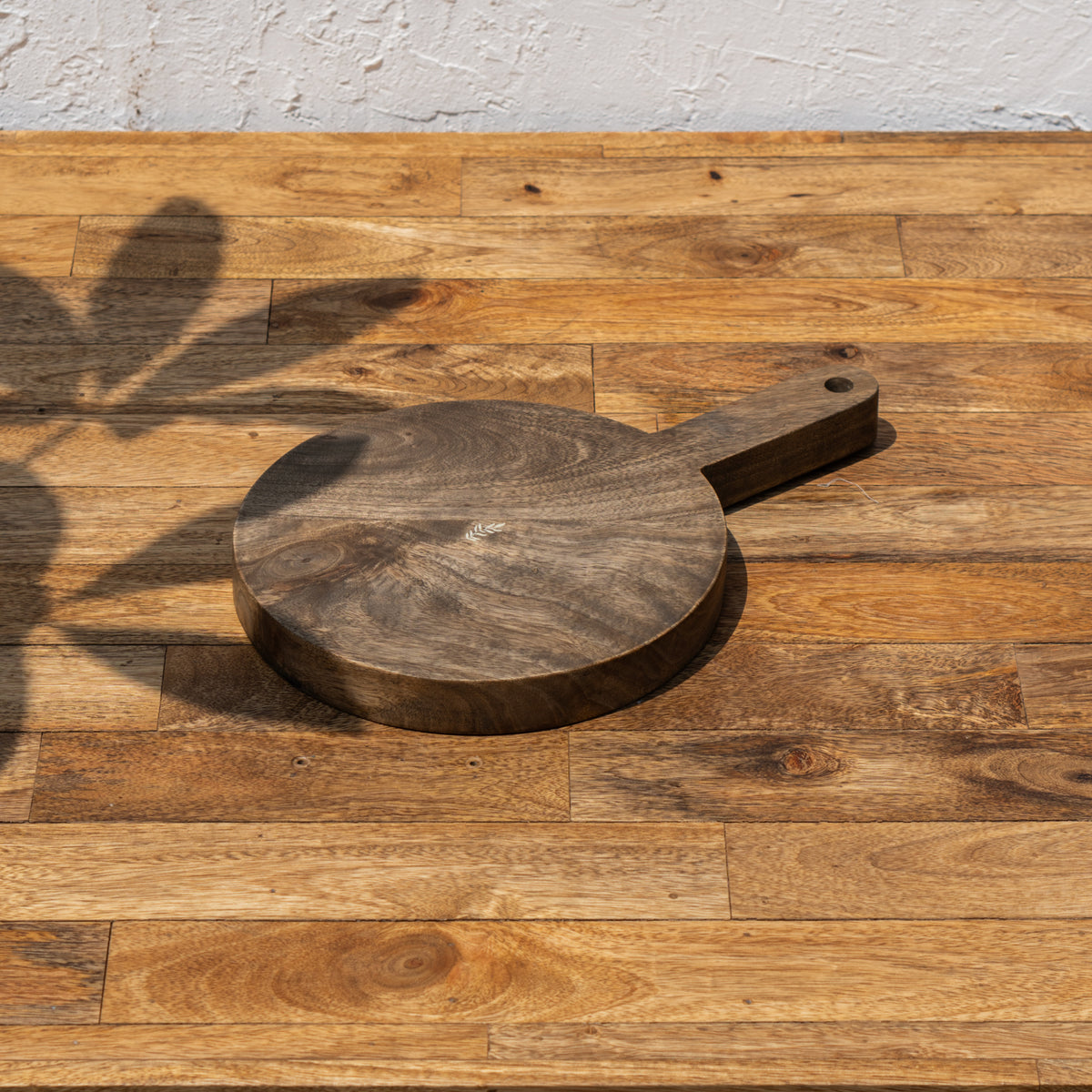 Angled view of the Ellipse wooden butcher board