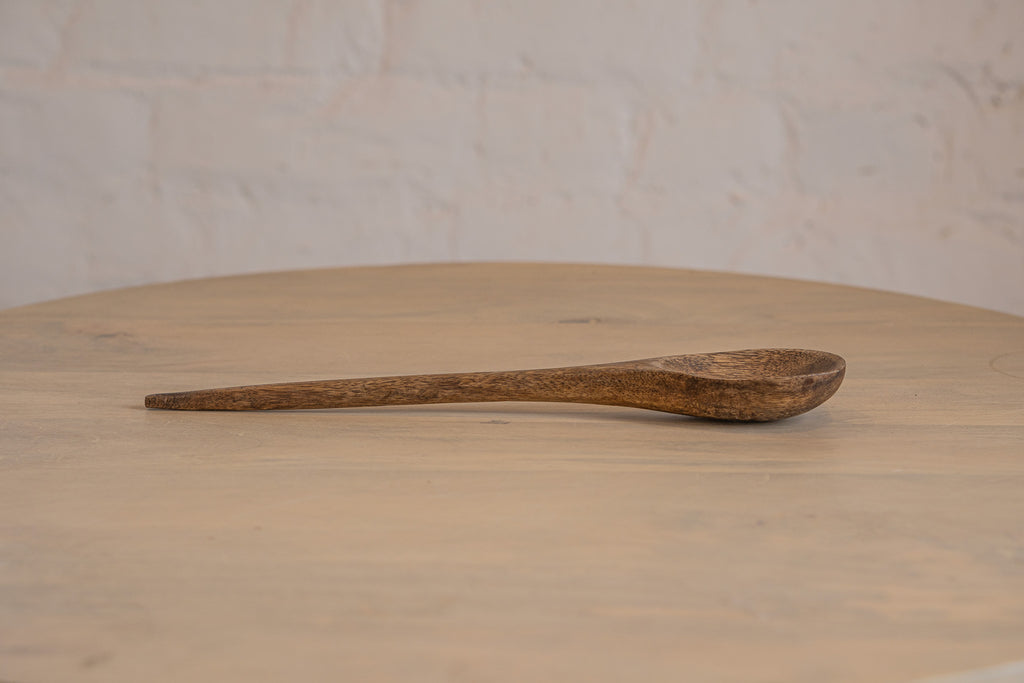 Side view of the Ellipse wooden salad servers