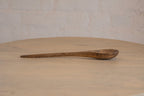 Side view of the Ellipse wooden salad servers