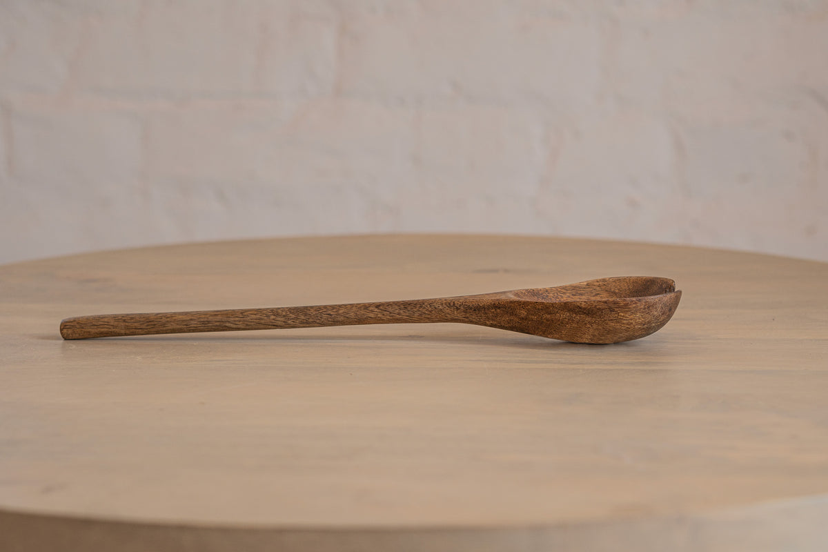 Low side view of the Ellipse wooden salad servers