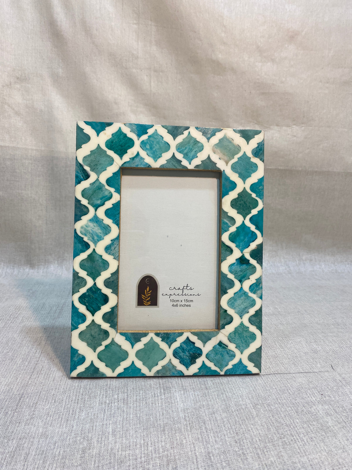 Green and warm-white trellis wooden photo frame for a 4 by 6 inch photograph
