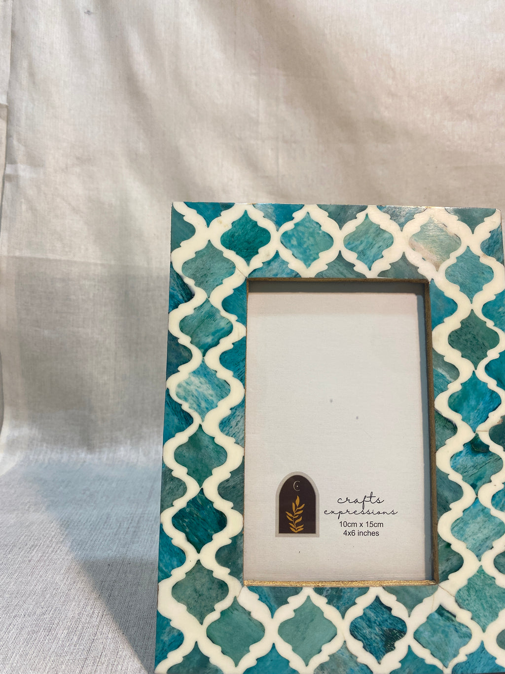 Green and warm-white trellis wooden photo frame for a 4 by 6 inch photograph