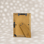 Warm-white wooden photo frame with fine blue-grey stripes for a 4 by 6 inch photograph