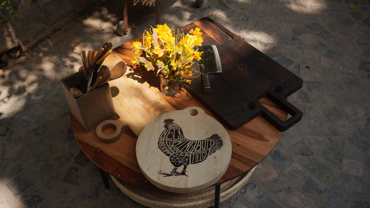 Oversized wooden butcher board styled on a table