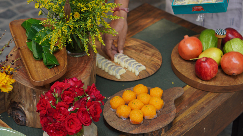 Large Plateau wooden board styled with fruit and flowers