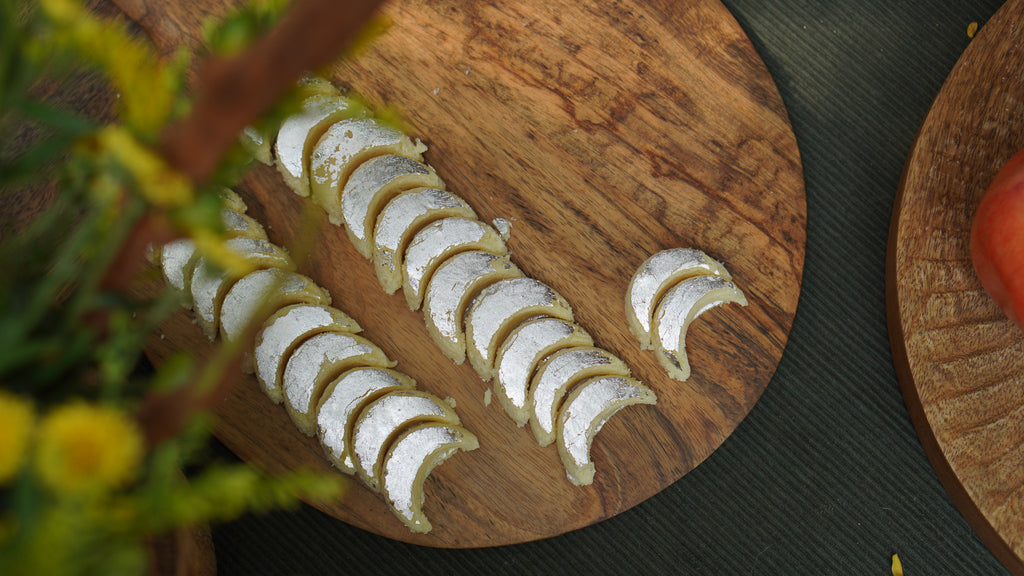 Large Plateau wooden board styled with sliced food