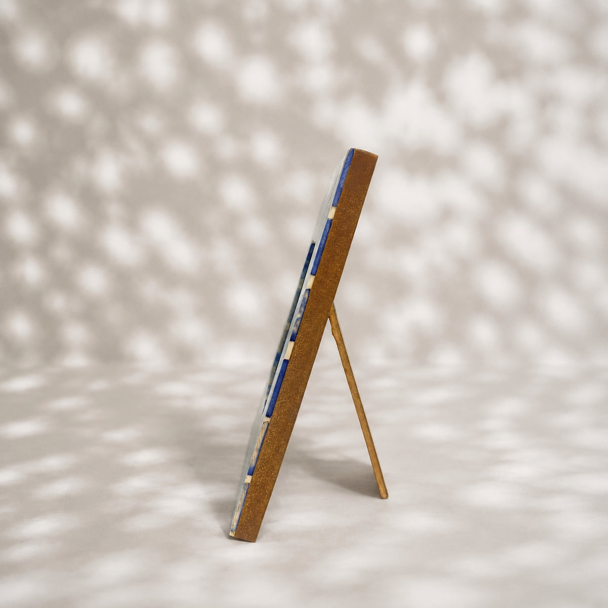 Blue and warm-white trellis wooden photo frame for a 4 by 4 inch photograph