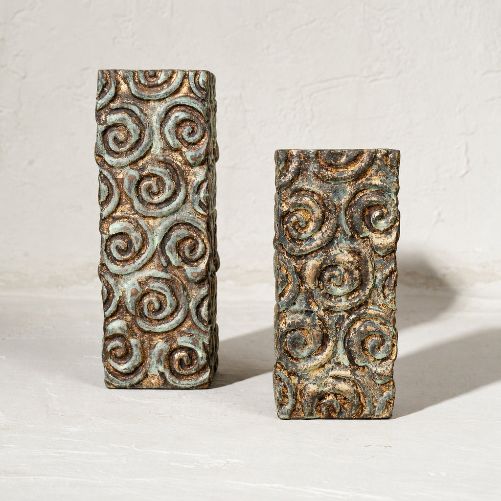 Set of two tall antique carved wooden tea light holders in different heights