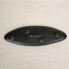 Black and white leaf-shaped wooden serving platter for snacks and mithai
