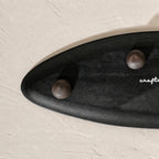 Black and white leaf-shaped wooden serving platter for snacks and mithai