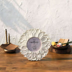 Classic white Lotus round photo frame styled with flowers