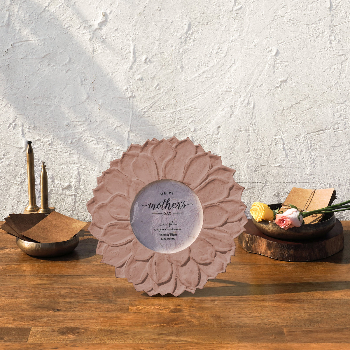 Earthy pink Lotus round photo frame styled with flowers