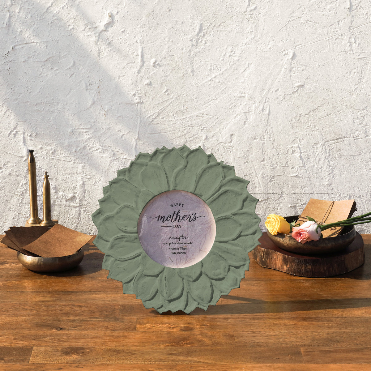 Olive green Lotus round photo frame styled with flowers and brass décor