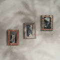 Set of three wooden magnetic Instax Mini photo frames in red and neutral patterns