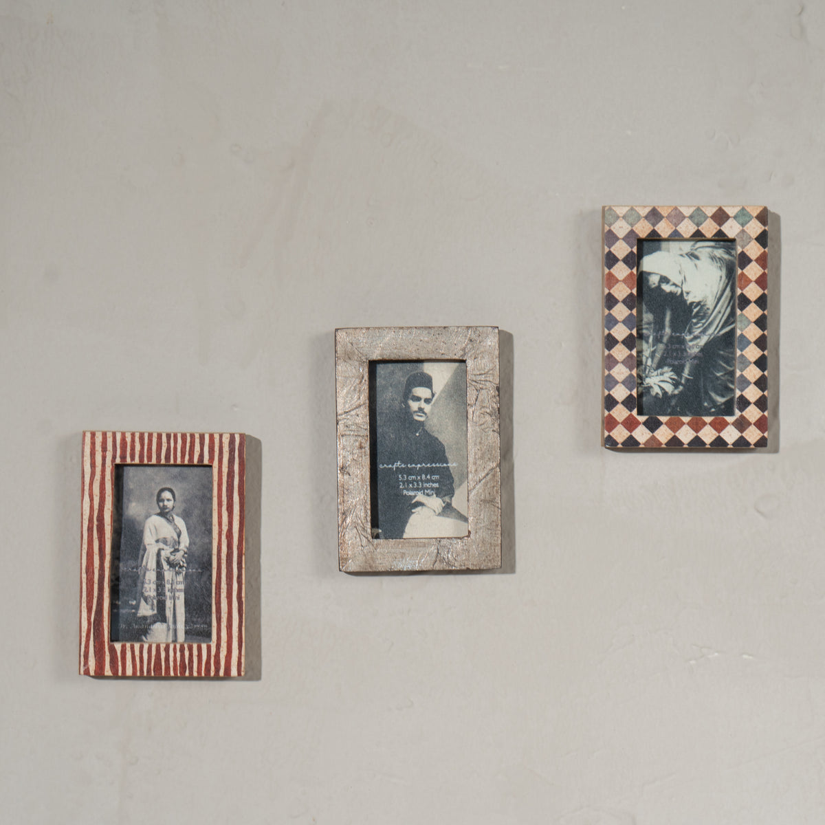 Set of three wooden magnetic Instax Mini photo frames in red and neutral patterns