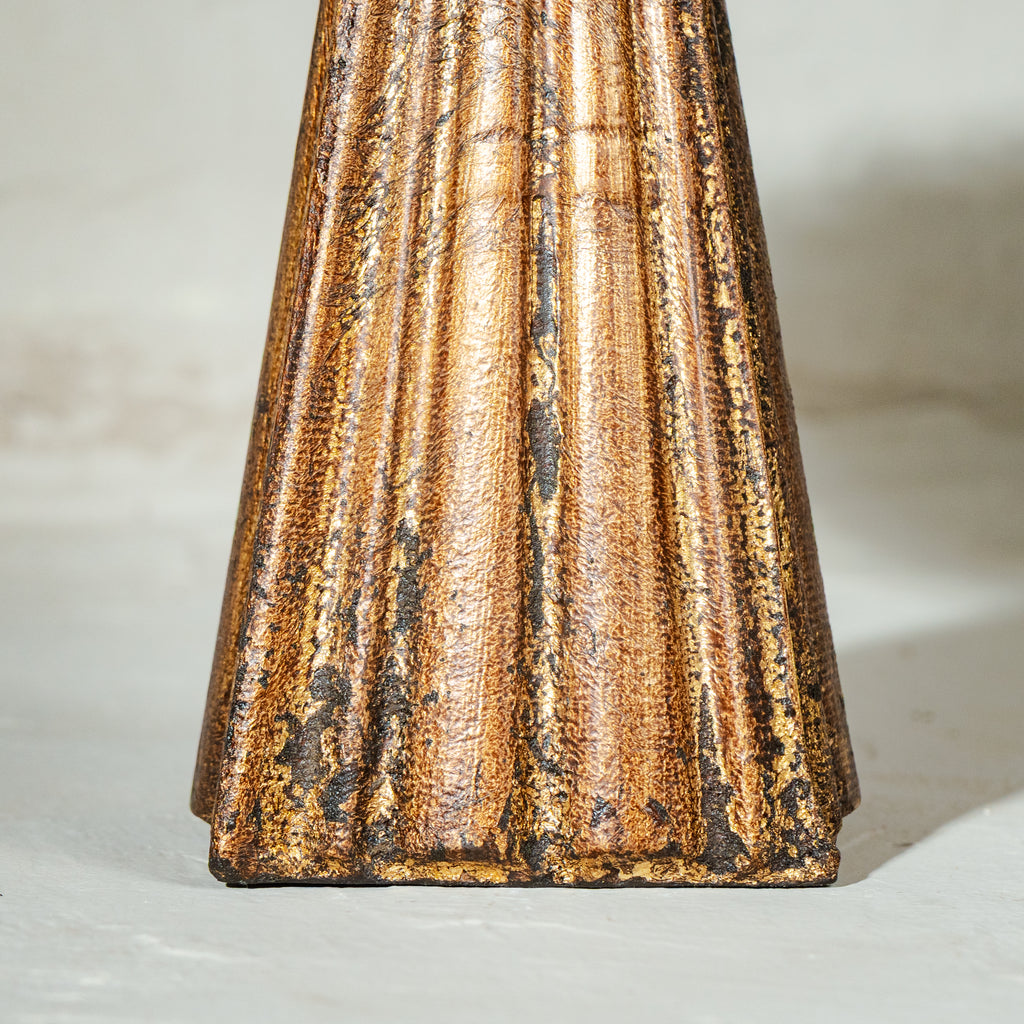 Antique gold and red wooden cake stand with flower-shaped top and tall pedestal