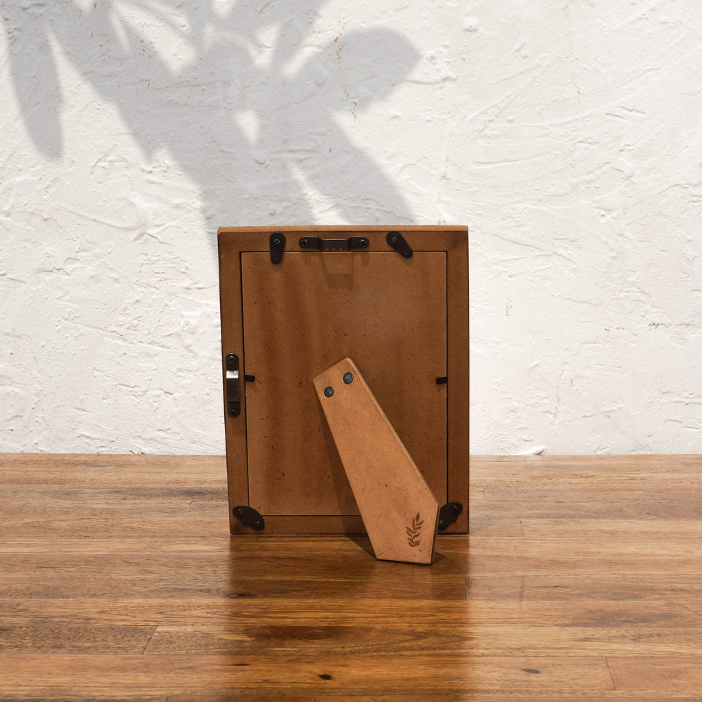 Back view of the earthy pink Mother of Pearl photo frame with easel stand and wall fittings