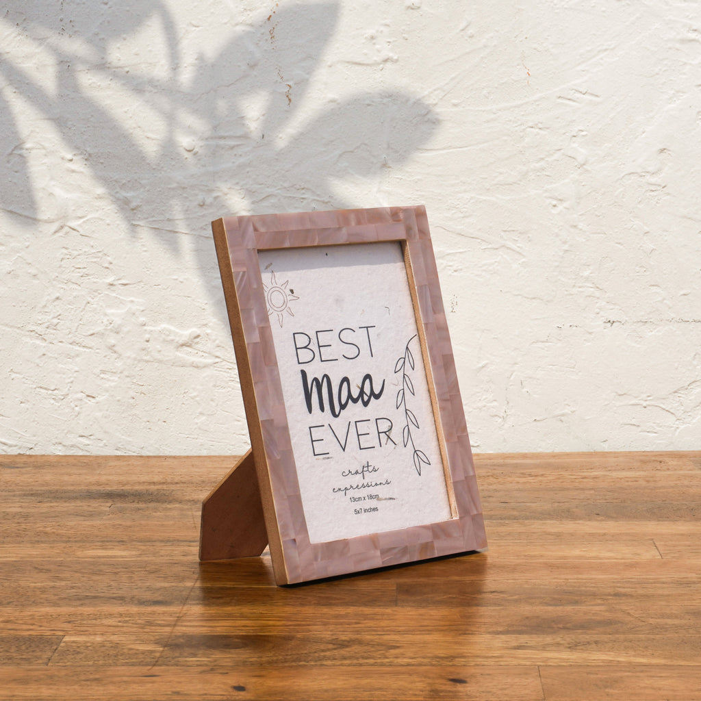 Angled side view of the earthy pink Mother of Pearl photo frame