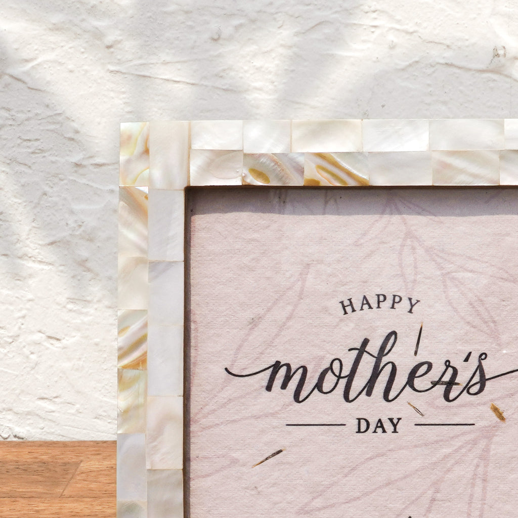 Close-up of the white Mother of Pearl photo frame inlay
